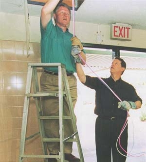 Clinton and Gore Installing Ethernet Wires